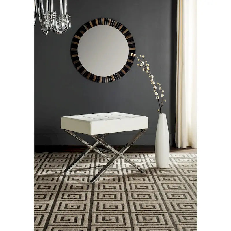 Pouf moderne capitonné en cuir avec base chromée en X