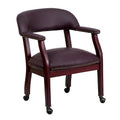 Fauteuil de conférence avec garniture cloutée et roulettes