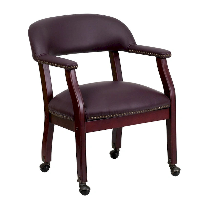 Fauteuil de conférence avec garniture cloutée et roulettes