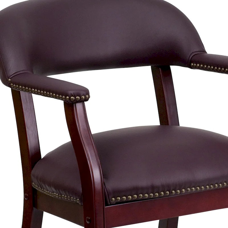 Fauteuil de conférence avec garniture cloutée et roulettes