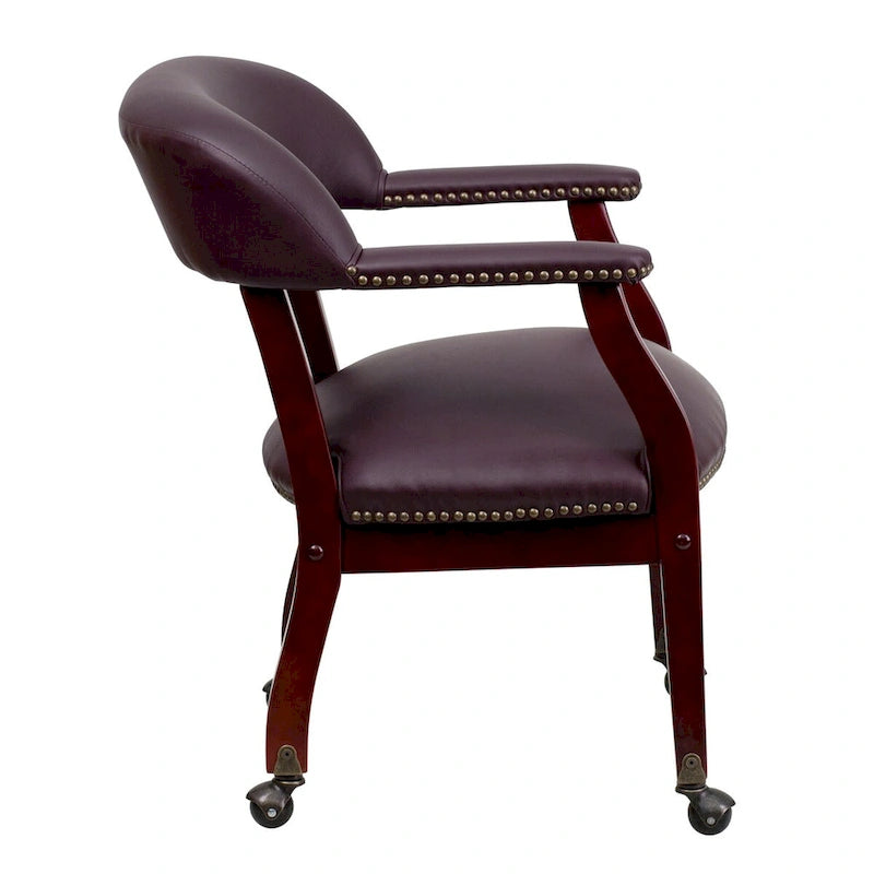 Fauteuil de conférence avec garniture cloutée et roulettes