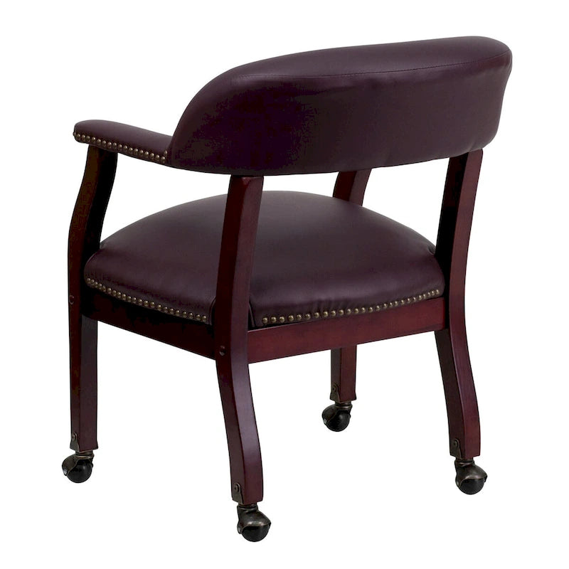 Fauteuil de conférence avec garniture cloutée et roulettes